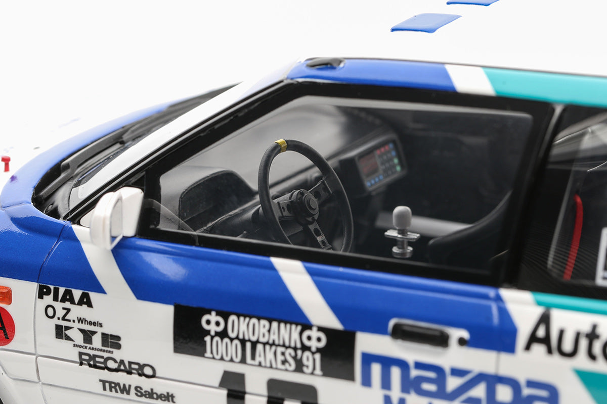 Mazda 323 GTX Gr.A 1000 Lakes Rally 1991 T. MÄKINEN 1:18